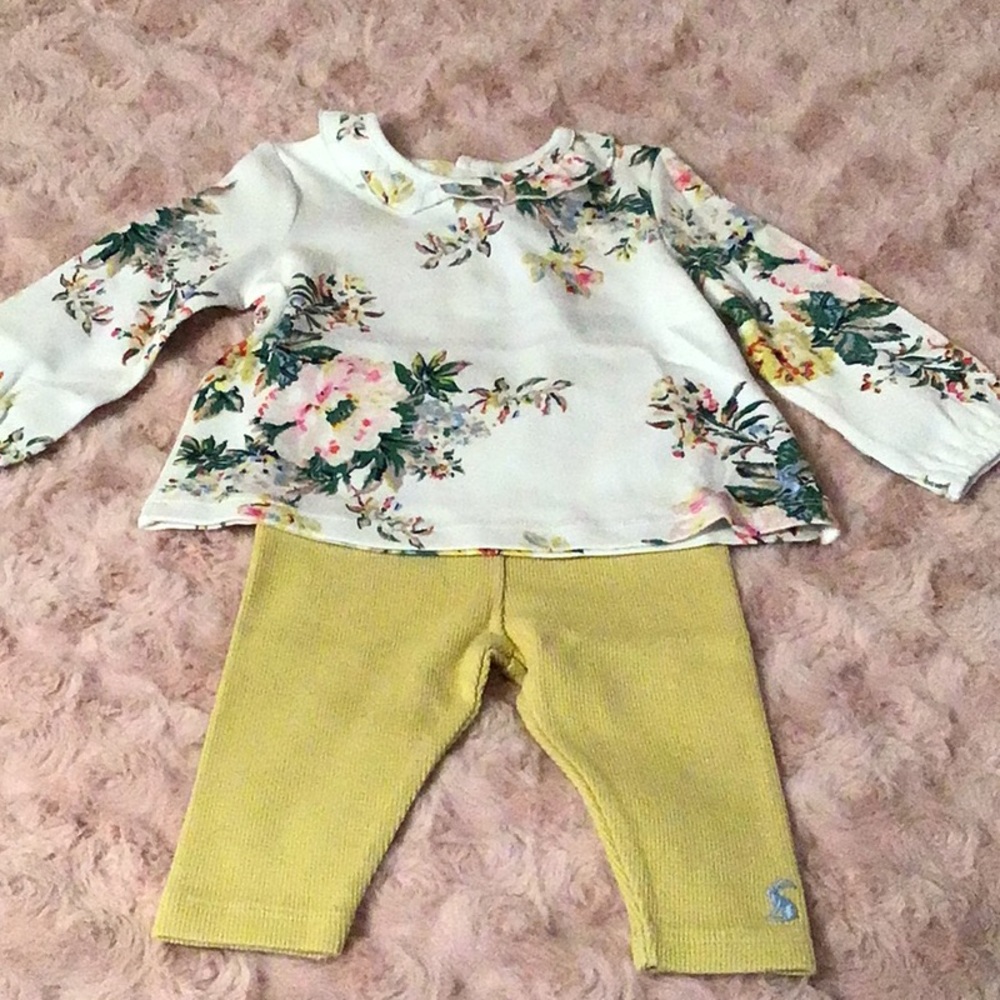Floral top and yellow pants